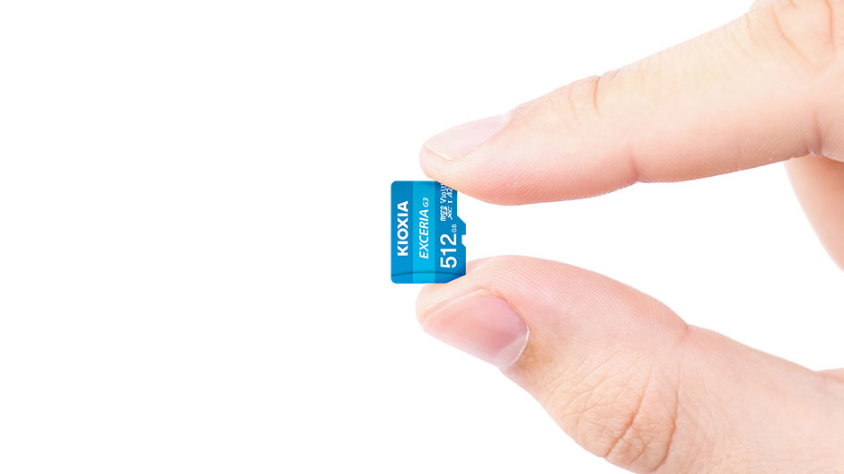 A hand holding the EXCERIA G3 microSD memory card